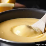 Home 20 슈크림 만들기 - A close-up, high-resolution image of a smooth, creamy custard being gently stirred in a heavy-bottom...